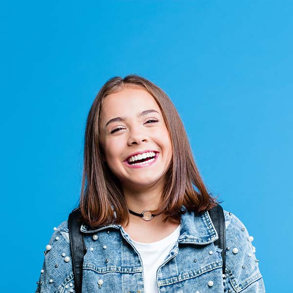 Cheerful pretty teenage girl